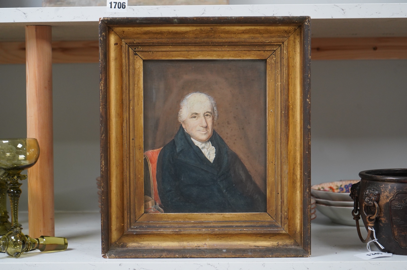 19th century School, Three-quarter length portrait of a gentleman wearing military dress, unsigned, watercolour, together with two other portraits of Victorian gentleman, largest 27 x 20cm, one housed in an ornate gilt f